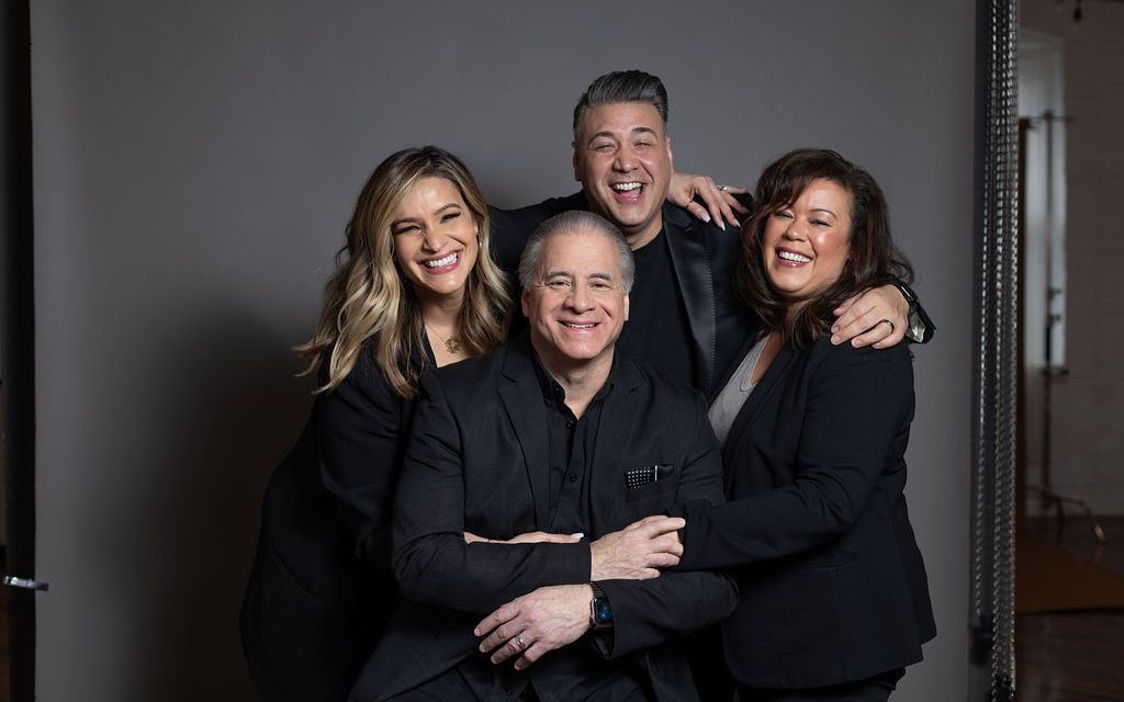Team headshot, leadership group, gray backdrop